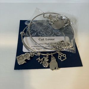 Pair of silver cat dangle bracelets